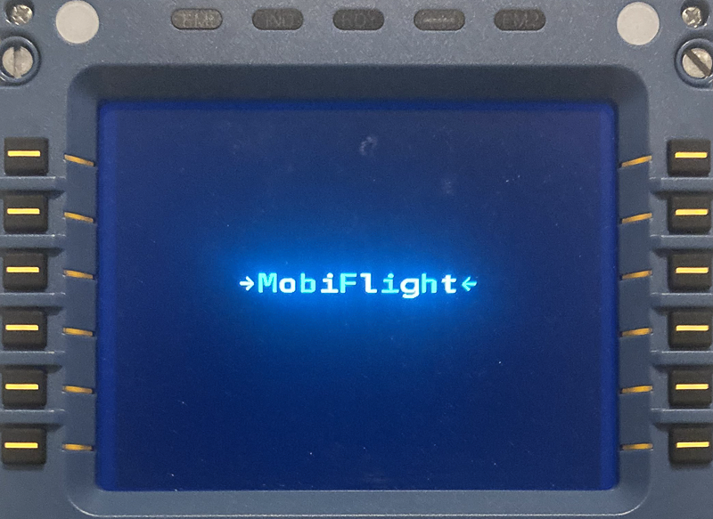 Photo of a WinCtrl CDU with -->MobiFlight<-- showing on the display.